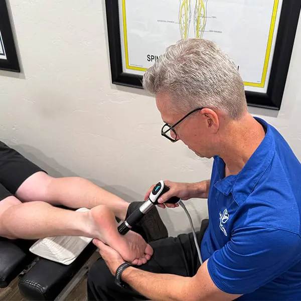 Shockwave Therapy targeting foot and ankle pain.